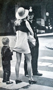 Child holding his mother’s mini skirt in the street of London, 1968